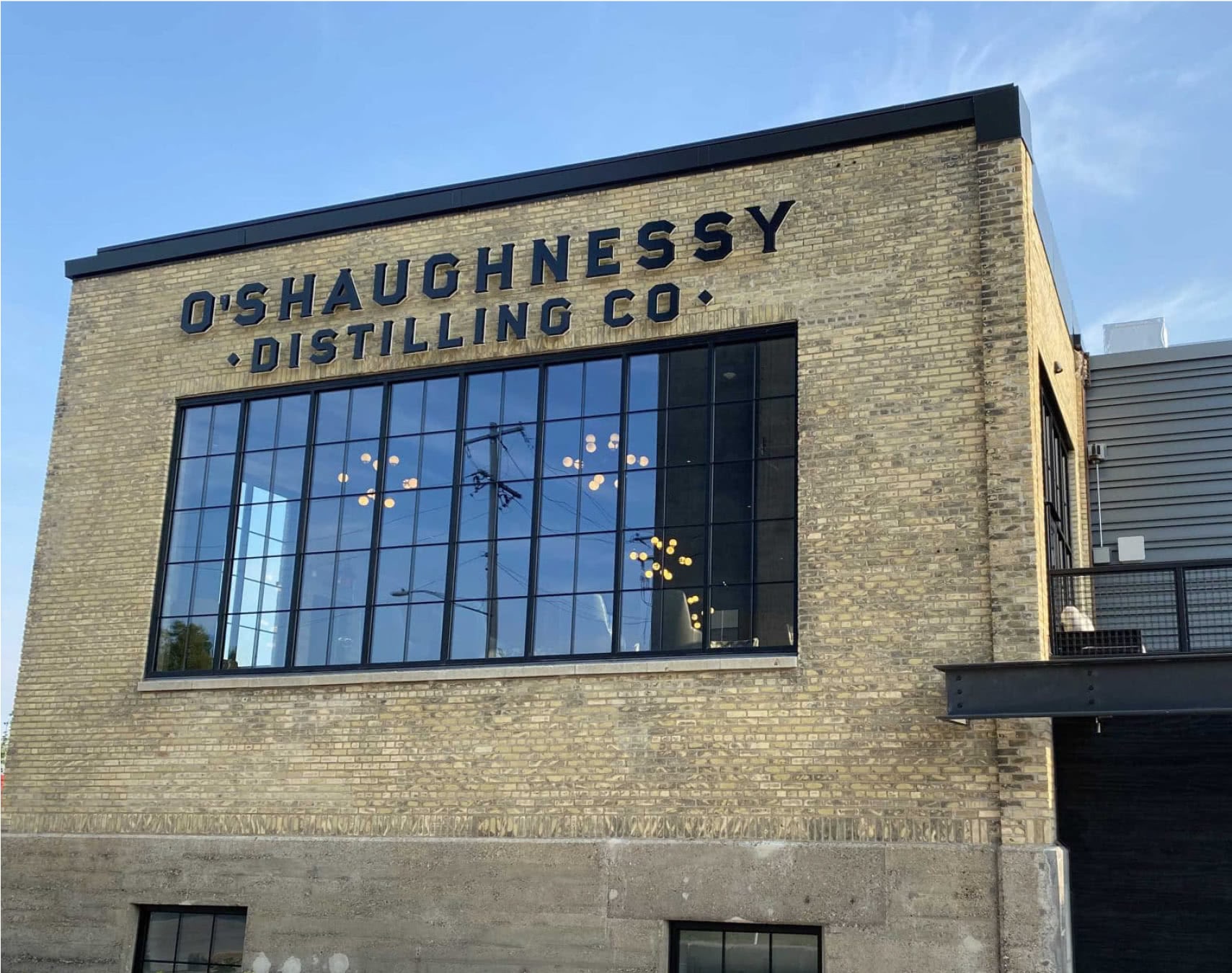 Photo O’Shaughnessy Distilling Co. building sign window