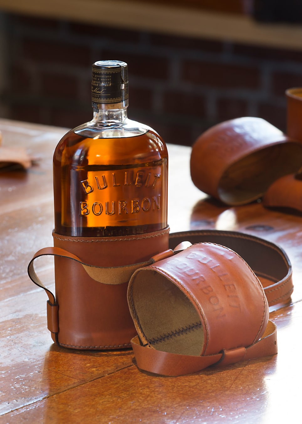 Bulleit Bourbon bottle leather case open